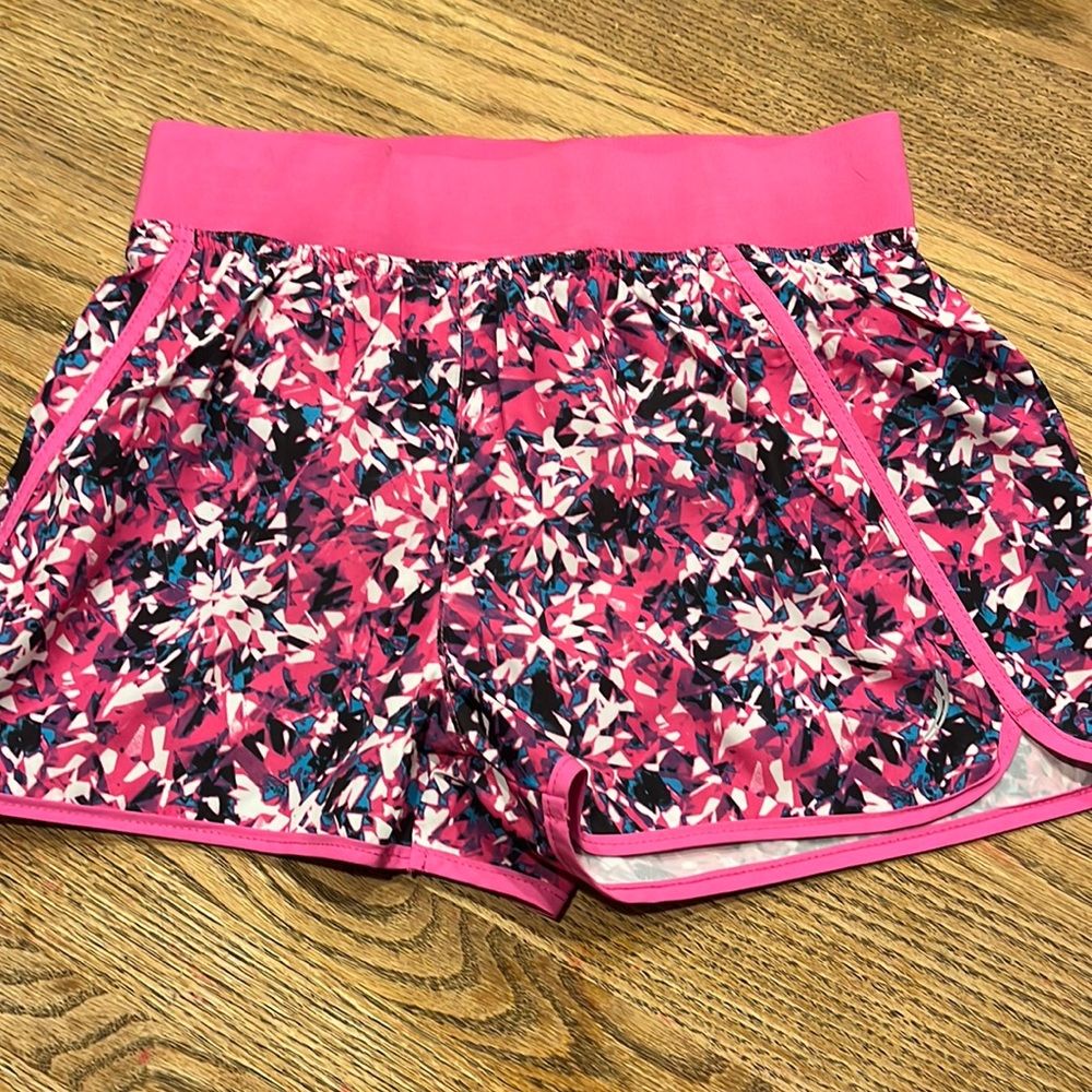 These are a pair of shorts. They are a size 20-12 girls. The brand is Exertek.